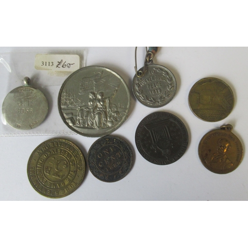 242 - A collection of medals and tokens, to include the International Exhibition, Kingswood & District med... 