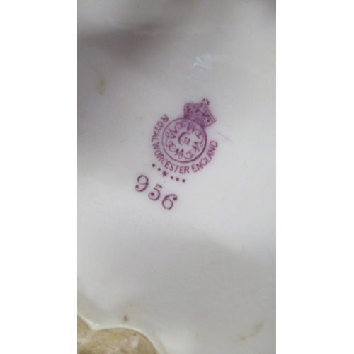 244 - Two Royal Worcester Chinese influence vases, of shaped cylindrical form, both af