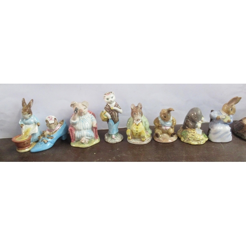 252 - 7 Beswick Beatrix Potter figures, together with a Royal Albert figure to include Susan, Old Mr Bounc... 