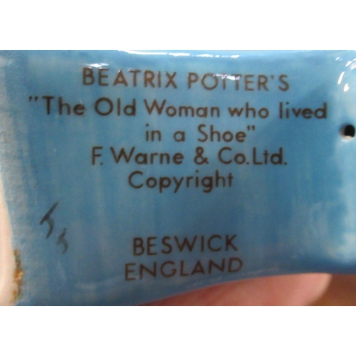 252 - 7 Beswick Beatrix Potter figures, together with a Royal Albert figure to include Susan, Old Mr Bounc... 