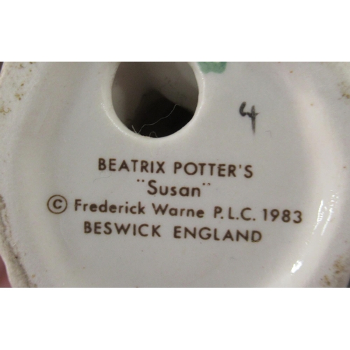 252 - 7 Beswick Beatrix Potter figures, together with a Royal Albert figure to include Susan, Old Mr Bounc... 