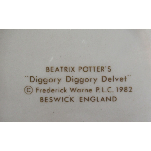 252 - 7 Beswick Beatrix Potter figures, together with a Royal Albert figure to include Susan, Old Mr Bounc... 