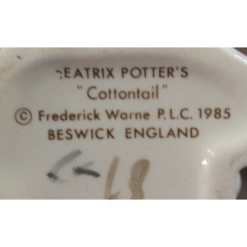 252 - 7 Beswick Beatrix Potter figures, together with a Royal Albert figure to include Susan, Old Mr Bounc... 