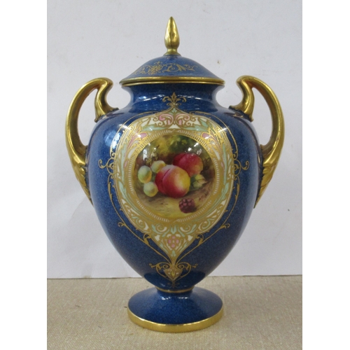 256 - A Royal Worcester covered pedestal vase, decorated with a circular reserve of fruit by Moseley, to a... 