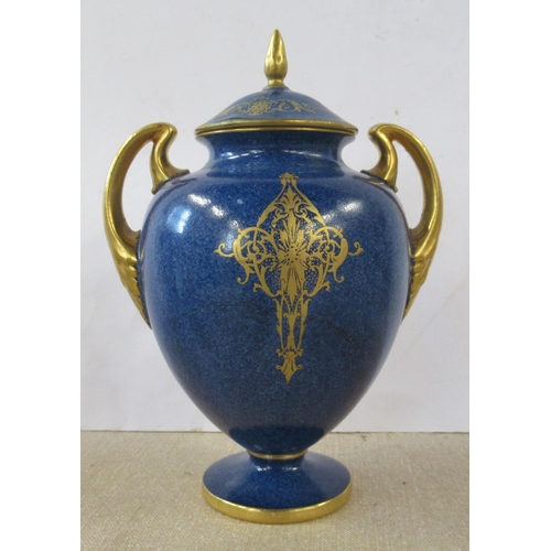 256 - A Royal Worcester covered pedestal vase, decorated with a circular reserve of fruit by Moseley, to a... 