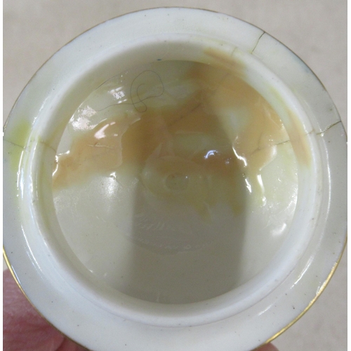 256 - A Royal Worcester covered pedestal vase, decorated with a circular reserve of fruit by Moseley, to a... 