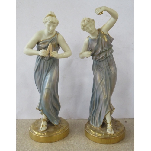 261 - A pair of Royal Worcester James Hadley figures, decorated in shot silk colours of two woman playing ... 