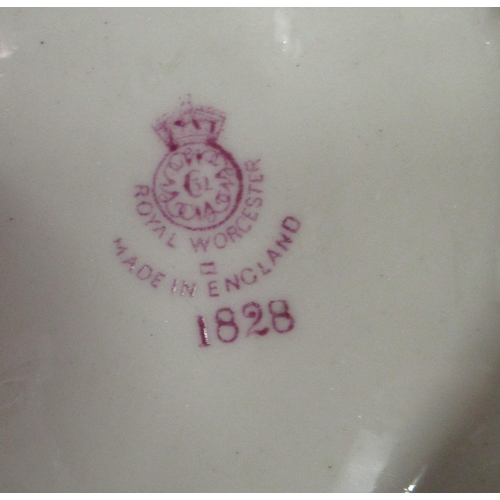 261 - A pair of Royal Worcester James Hadley figures, decorated in shot silk colours of two woman playing ... 