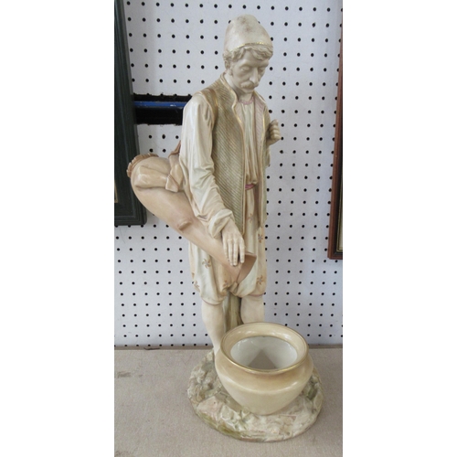 262 - A large Royal Worcester blush ivory figure, of a man pouring water into a vase, height 18ins