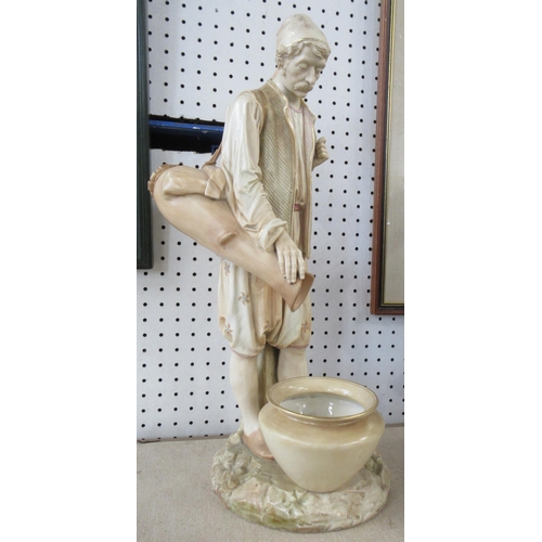 262 - A large Royal Worcester blush ivory figure, of a man pouring water into a vase, height 18ins