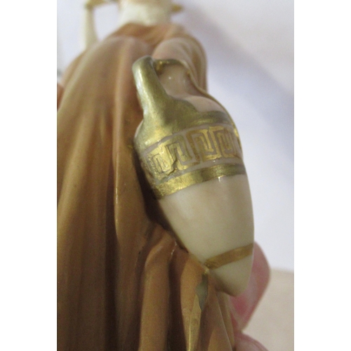 263 - A Royal Worcester shot silt figure, of a water carrier, model number 125, height 10ins, together wit... 