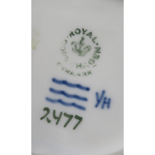 264 - A Royal Copenhagen model, of three birds, No 1045  made before 1927, together with a frog on a dish ... 