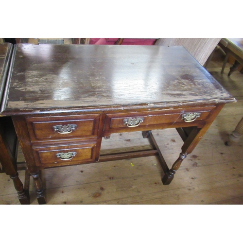 51 - An oak desk  48ins x 19.5ins height 30ins  and an oak dressing table 36ins x 19ins height 30ins