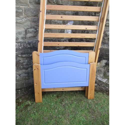 65A - A pair of painted pine single bed frames