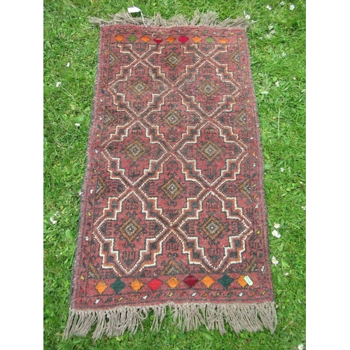 71 - A small prayer mat with a deep field with tassel pattern approx 36ins x 21ins