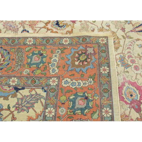 74 - A large rug, with floral scroll decoration, 110ins x 148ins