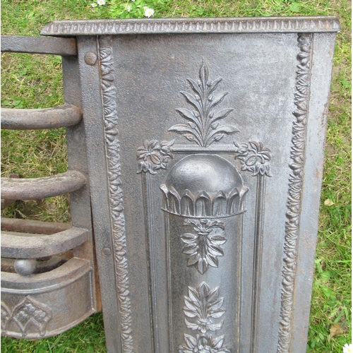 80A - A Dale Co cast iron fire grate, with neo classical decoration