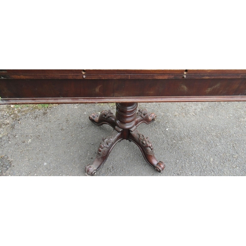 88 - A Victorian fold over tea table, raised on carved legs