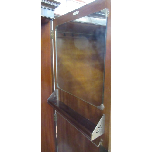 92 - A triple door wardrobe, 73ins x 71ins