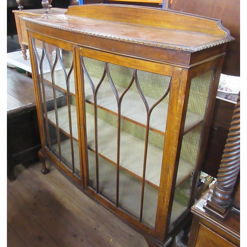 98 - A bow front display cabinet, width 48ins, height 51ins