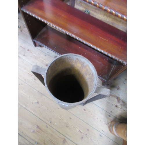 24b - A metal post rammer