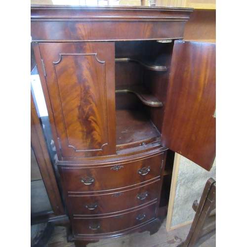 37 - A reproduction mahogany tall boy, width 22ins, height 53ins