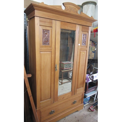 91 - An Edwardian mirror door wardrobe, 84ins x 47ins