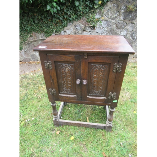 55B - An oak Rachshaw style bedside cabinet width 20ins, height 27ins together with a cabinet