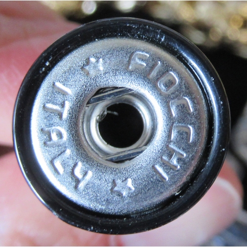 243A - Two Dior necklaces, together with others, in display cases