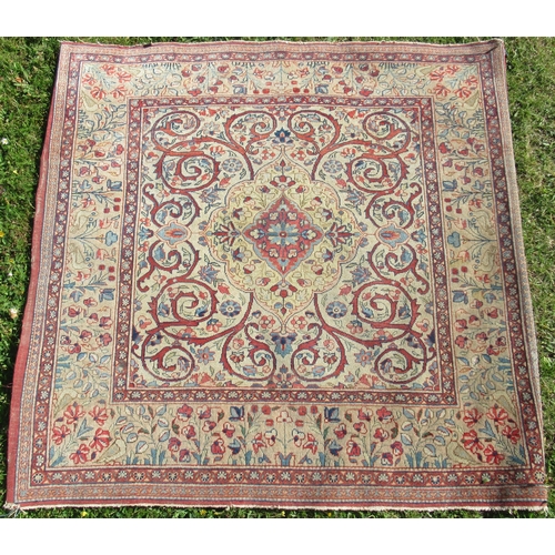 A square eastern design rug, 41ins x 41ins
