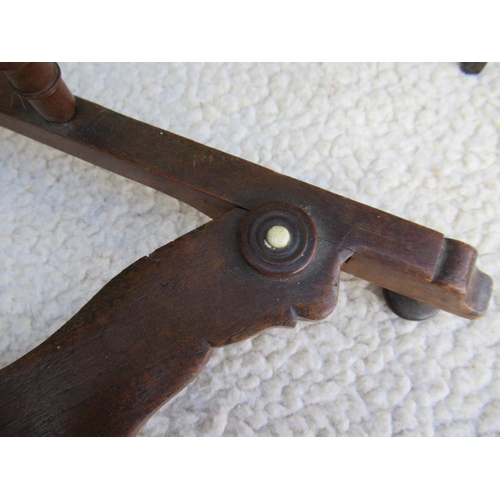 10 - (43) A small antique spinning wheel with bobbin turned supports raised on a triangular base, height ... 