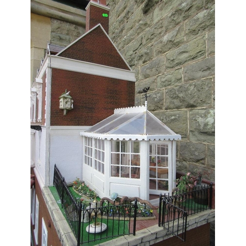 11 - (41) A modern dolls house in the Georgian style, width 54ins, height 47ins, depth 18ins