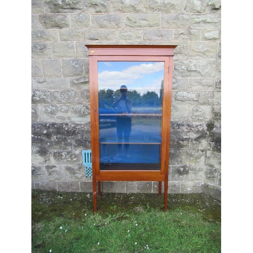 14 - (46) An Edwardian mahogany display cabinet with chequered banded frieze and a glazed door opening to... 