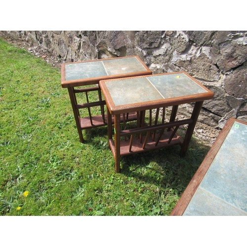 15 - (44) A rectangular coffee table, 41ins x 21.5ins and two matching magazine tables, all with a slate ... 