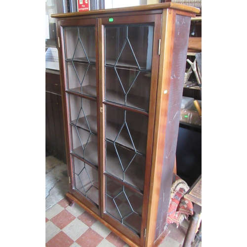 22 - A mahogany glazed cabinet, 61ins x 34ins, depth 11ins