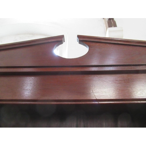 24 - A 19th century design mahogany set of shelves, having broken arch pediment, over adjustable shelves,... 