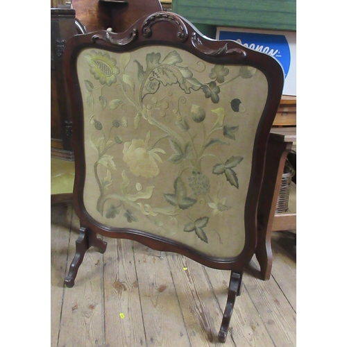 26 - A 19th century mahogany framed fire screen