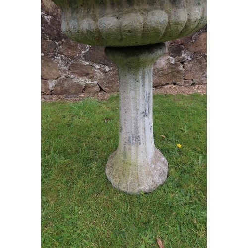 39 - A pair of stone bird baths, height 28ins, width 17ins