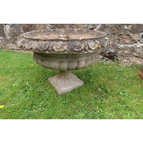 40 - A stone garden urn 23ins diameter height 16ins