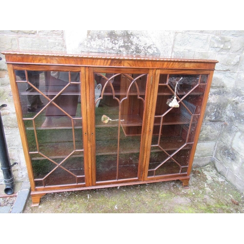 45A - An Edwardian mahogany three door display cabinet width 54ins