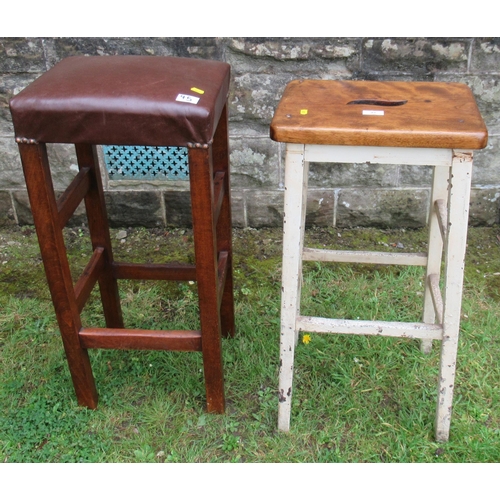 45 - Two high stools, one with painted base, the other with leather top