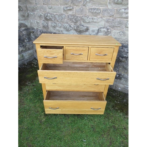 48 - (58) A modern oak chest of three short drawer over three long drawers, width 38.5ins, depth 16.5ins,... 