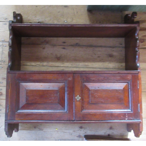 49 - A mahogany wall cabinet