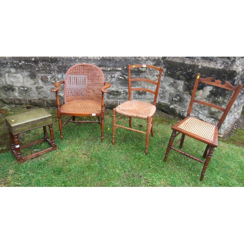 51 - Three cane chairs and a leather topped stool