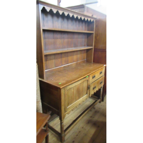 57 - An oak dresser, with boarded plate rack, width 54ins, height 74ins together with a Victorian chair