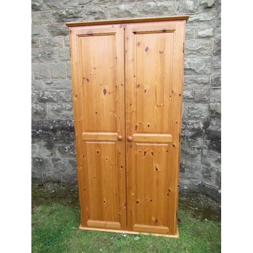 58 - A modern pine two door wardrobe width 34ins