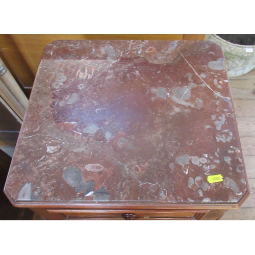 63 - A 19th century mahogany and marble topped chest, of drawers, fitted with real and dummy drawers with... 