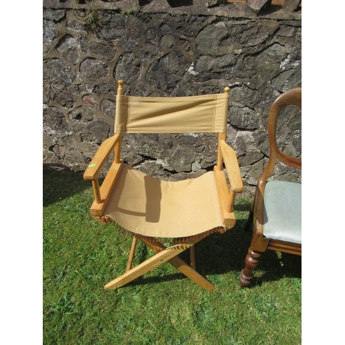 67 - An Edwardian tub chair and a directors chair and two other chairs