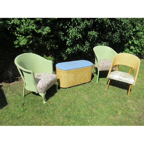 7 - (38)Two green painted Lloyd Loom chairs, another chair and an Ottoman