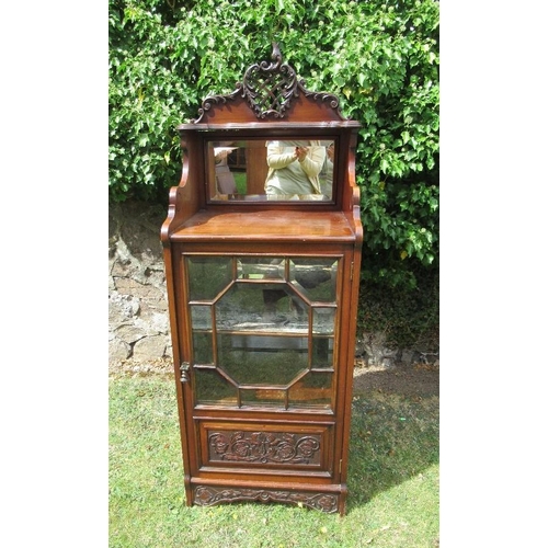 70 - An Edwardian mahogany music cabinet width 21.5ins